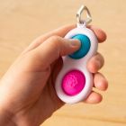 Sensorinis žaislas - raktų pakabukas ,,Simpl Dimpl" (įvairių spalvų)